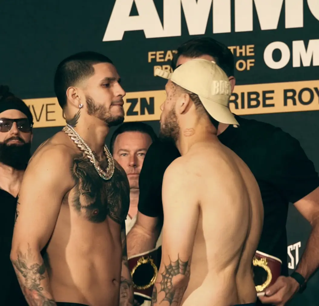 Fighters facing off at the pre-fight weigh-in